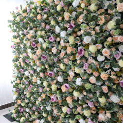 mixed color roses and green lasagna daisies and green leaves cloth roll up flower wall fabric hanging curtain plant wall event party wedding backdrop