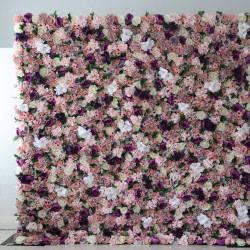 pink and light green roses and pink hydrangeas and purple peonies and green leaves cloth roll up flower wall fabric hanging curtain plant wall event party wedding backdrop